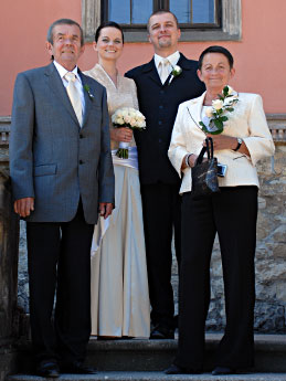 Newlyweds with bride's parents